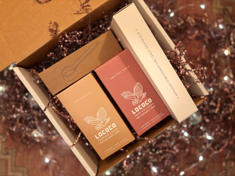 The LOCOCO cocoa bundle kit with both flavors, a frother and a scoop