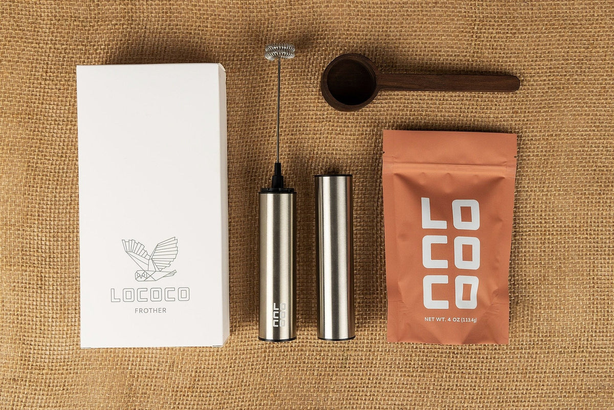 The LOCOCO Original Spice cocoa kit with a frother and wooden scoop