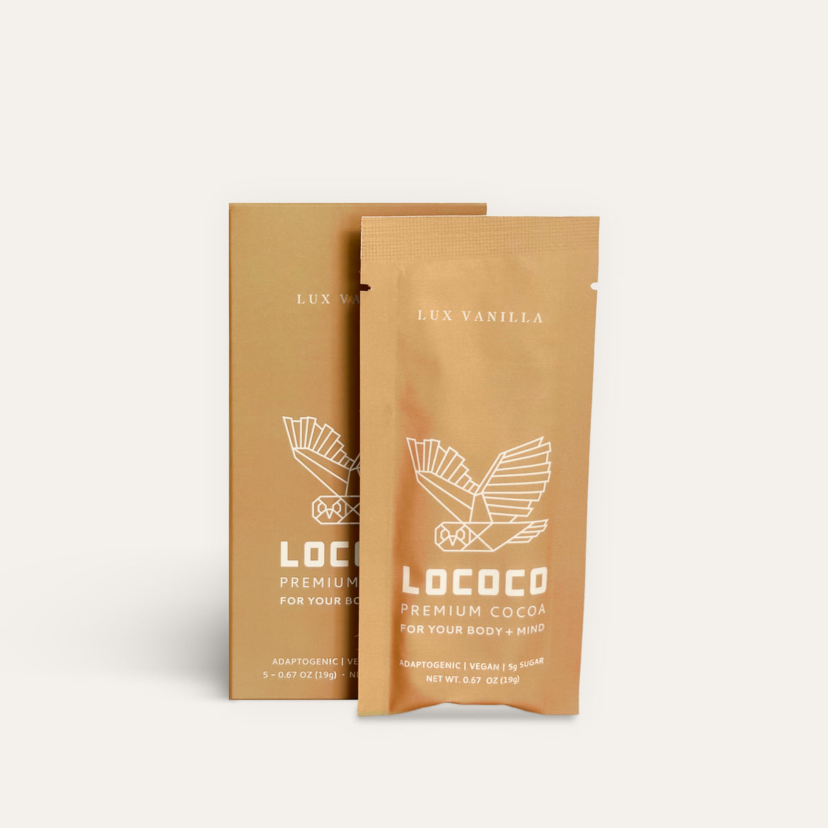A box of LOCOCO Lux Vanilla to-go cocoa sachets with one sachet in front
